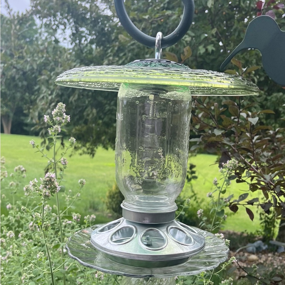 Handmade crystal bird feeder with vintage and antique crystal dishes
